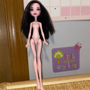 Monster High Doll with Black Hair and Pink Accents